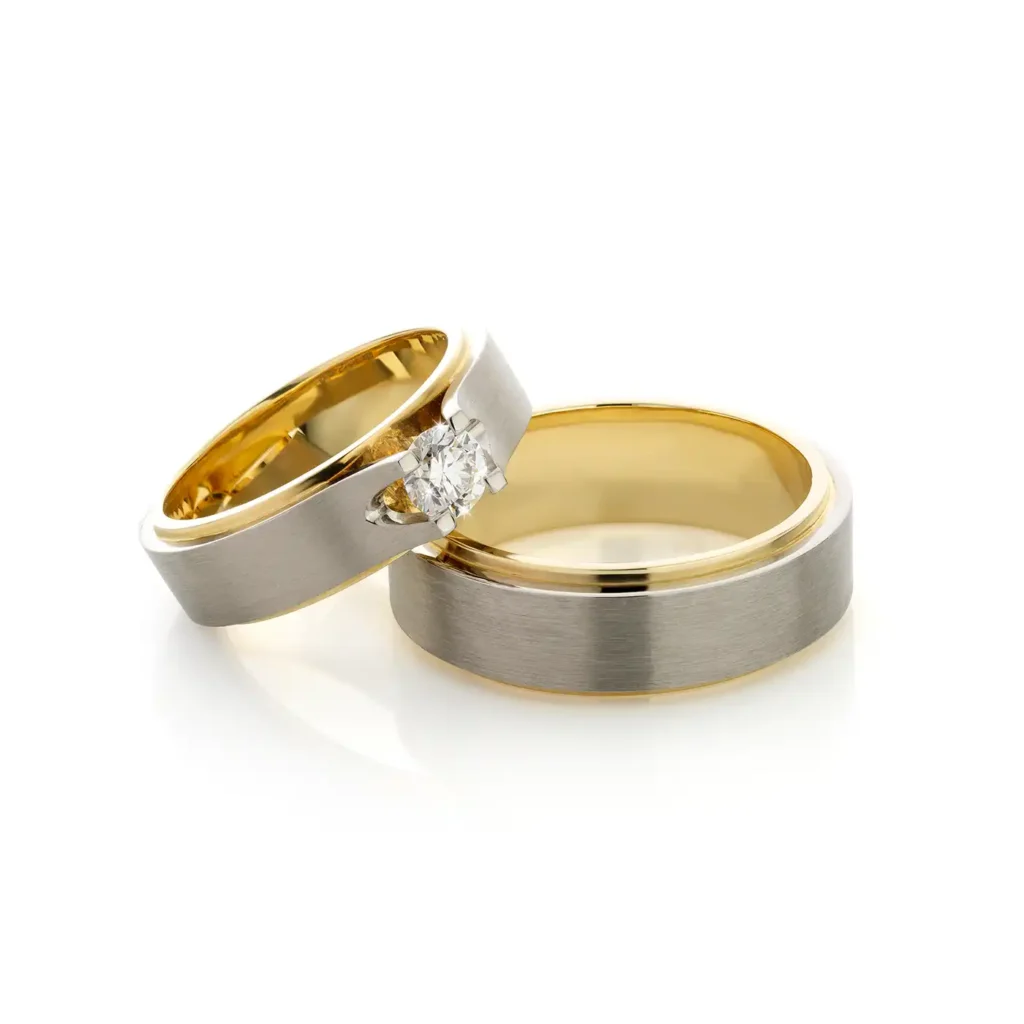 Trouwringen Kings and Queens, gemaakt van 14 karaat geelgoud met witgoud