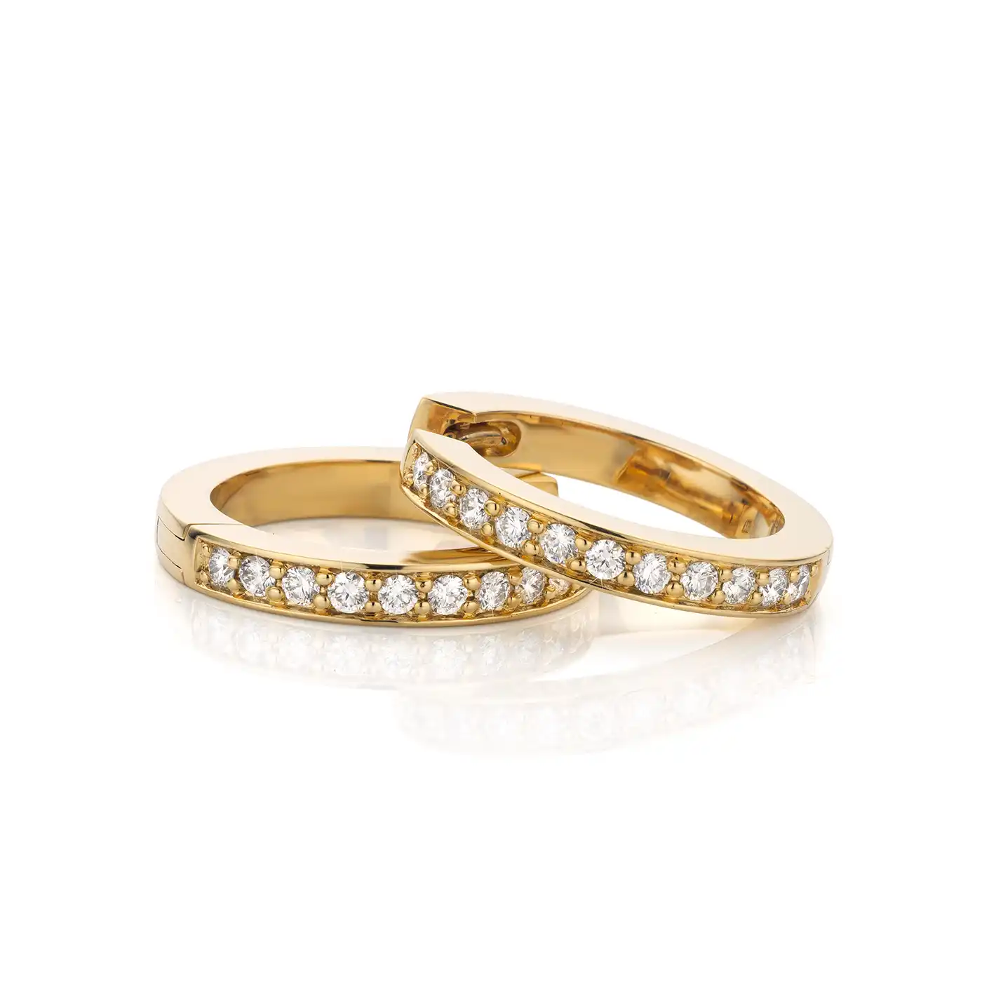Large creoles in yellow gold with diamonds
