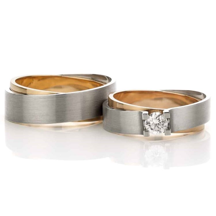 Trouwringen 14 kt. geel/witgoud met diamant “Crossover Avenue-Tiara”